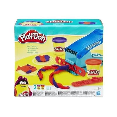 Press och verktyg för att göra rolliga former med Play-Doh leran. 